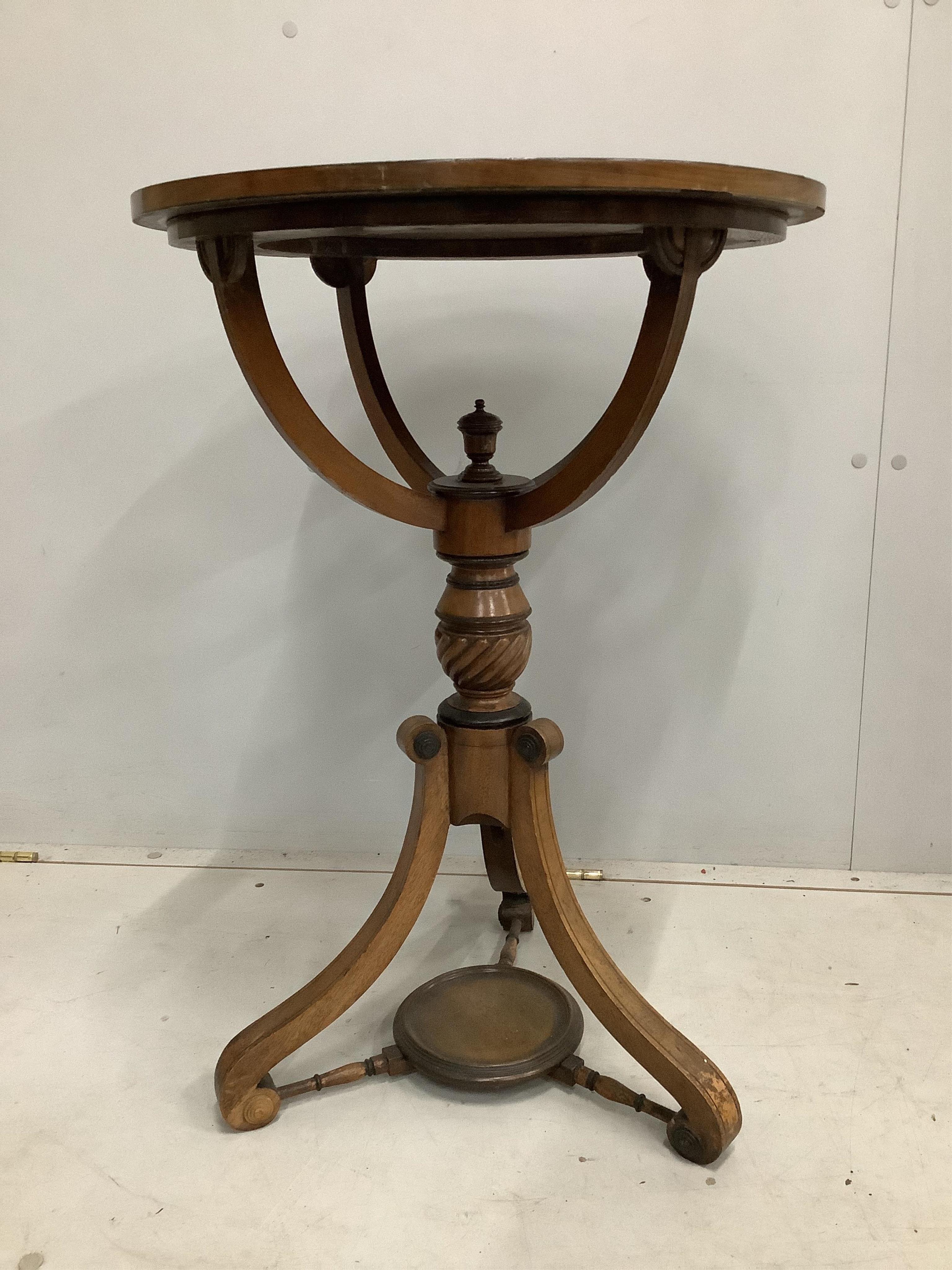A 19th century and later inlaid mahogany circular occasional table, adapted from a globe stand, diameter 48cm, height 70cm
